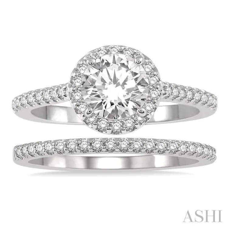 1 1/4 ctw Diamond Wedding Set With 1 1/10 ctw Halo 3/4 ctw Round Cut Center Stone Engagement Ring and 1/5 ctw Wedding Band in 14K White Gold