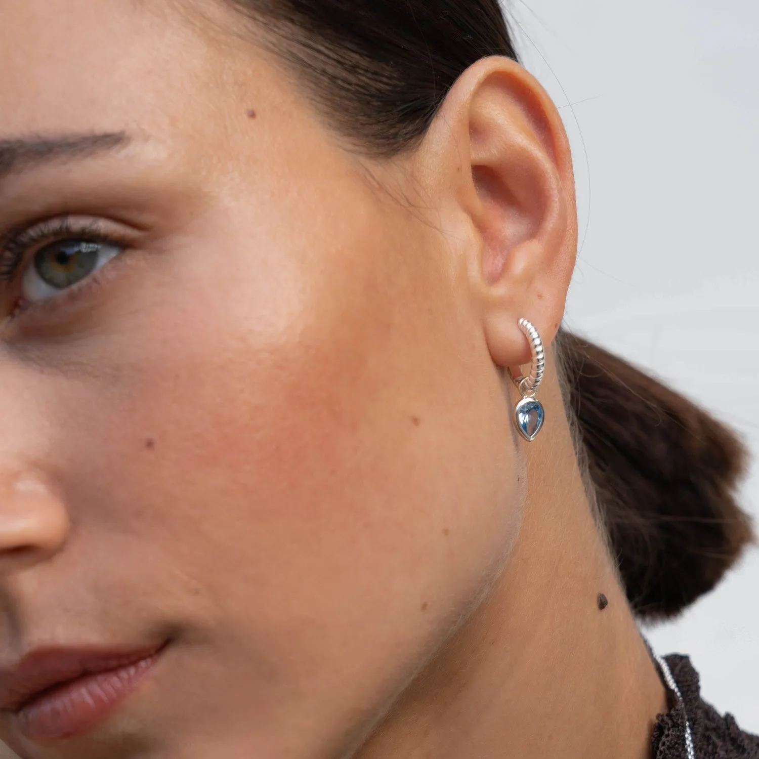 Blue Topaz Twist Huggie Charm Hoops