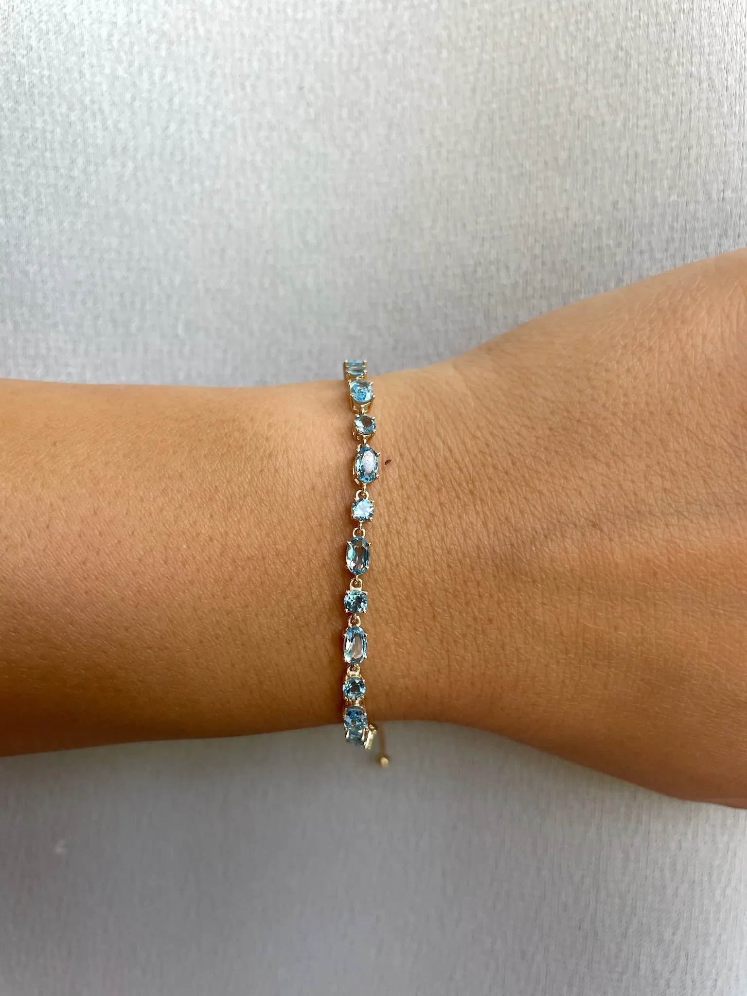 Gold Gem Bolo Bracelet Blue Topaz